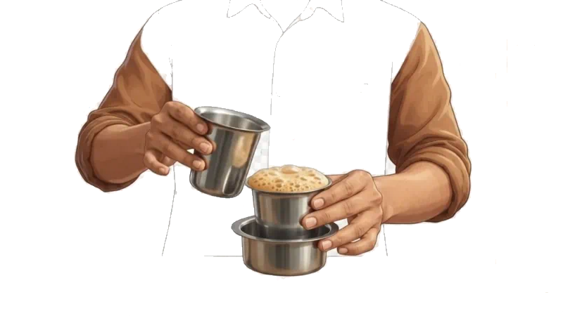 Filter coffee being poured back and forth between a steel tumbler and a dabara